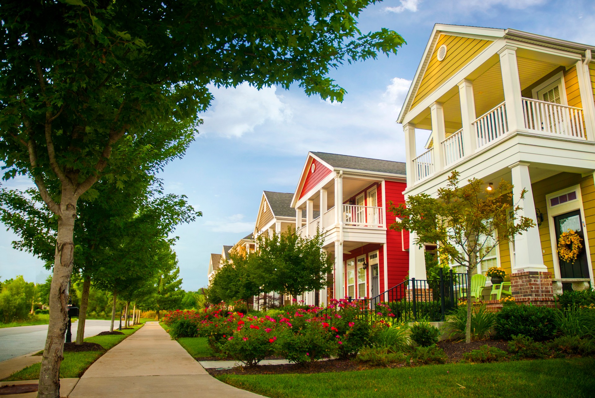 Row of colorful garden homes in suburban area